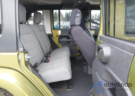 2007 Jeep Wrangler Unlimited Sahara from USA, damaged, VIN 1J8GA59167L128166